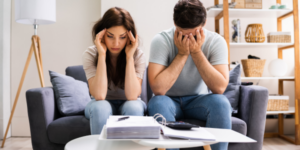 Family In Financial Trouble Having Stress Over Debt when homebuying